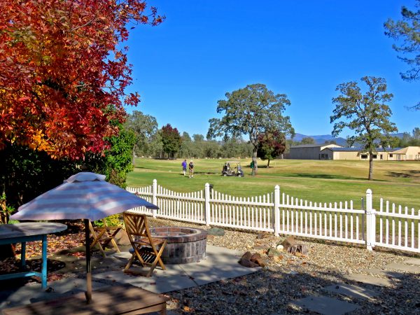 Gold Hills Golf Course Homes, Redding CA - Backyard view of the tee on hole 11