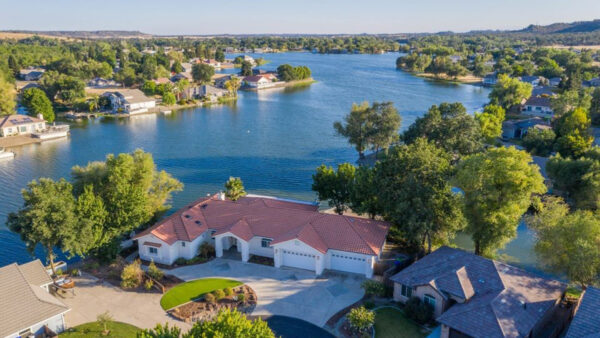 Lake California, Cottonwood CA - Aerial view of a home and lake